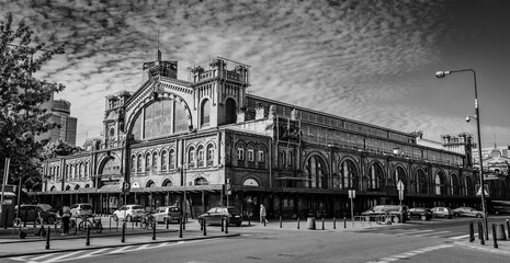 Warsaw, Poland - 05 13 2024: Black and white image of the Hala Mirowska market building.