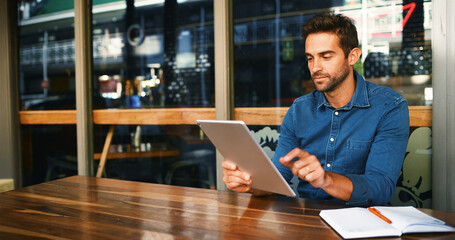 Cafe, man and reading on tablet for remote work, article information or online blog for...