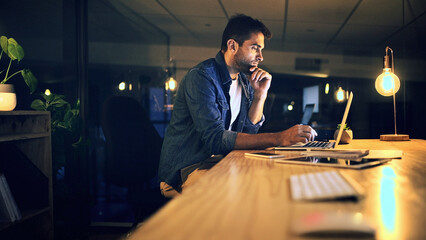 Laptop, night and thinking with business man in office for deadline or feedback on creative report....