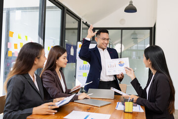 Group of business people working together with dashboard analysis and data management a meeting table in office.