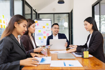 Business people working together in a meeting, Asian Business teamwork.