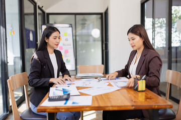 Businesswomen working plan analysis project brainstorm in modern office, Asian businesspeople team...