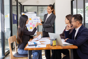 Group of Asian business working with analysis project brainstorm in modern office, Asian...