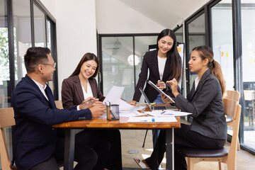 Group of Asian business working with analysis project brainstorm in modern office, Asian...