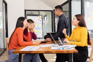 Group of Asian business working analysis project brainstorm in modern office, Asian businesspeople team working together, Business startup and company strategy planning concept.