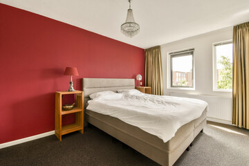 Modern Bedroom Interior with Red Accent Wall