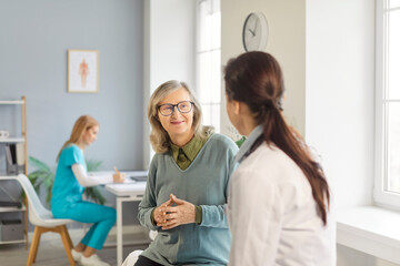 Senior woman talk consultation, nursing care, health of elderly people, doctor explaining, geriatric nurse helping checking healthcare, hospital professional controlling patient, listening, explaining