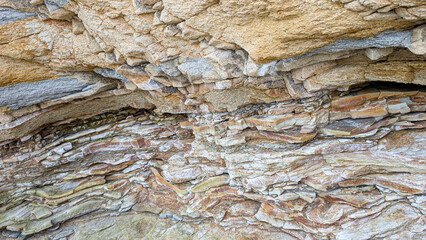 Sedimentary rock sequence transitioning from deep water turbidity deposits to shallow water shales,...