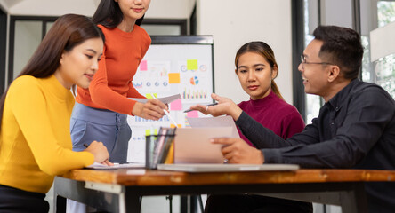 Group of Asian business people working together and presentation a meeting in office, 