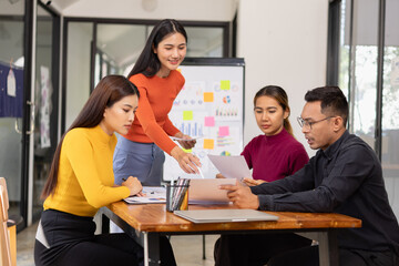 Group of Asian business people working together and presentation a meeting in office, 