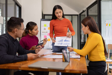 Fototapeta premium Group of Asian business people working together and presentation a meeting in office, 