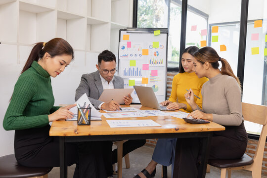 Group of business people working together with dashboard analysis and data management in conference room, Corporate business and dashboard to presentation concept.