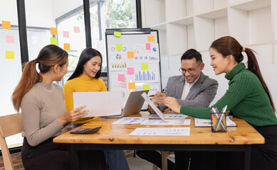 Group of business people working together with dashboard analysis and data management in conference...