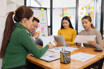Group of business people working together with dashboard analysis and data management in conference room, Corporate business and dashboard to presentation concept.