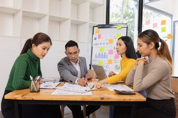 Fototapeta premium Group of business people working together with dashboard analysis and data management in conference room, Corporate business and dashboard to presentation concept.