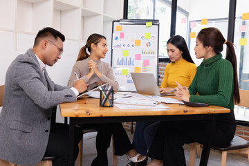Group of business people working together with dashboard analysis and data management in conference room, Corporate business and dashboard to presentation concept.
