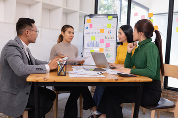Group of business people working together with dashboard analysis and data management in conference room, Corporate business and dashboard to presentation concept.
