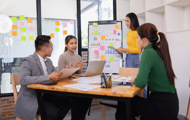 Obraz premium Group of business people working together with dashboard analysis and data management in conference room, Corporate business and dashboard to presentation concept.