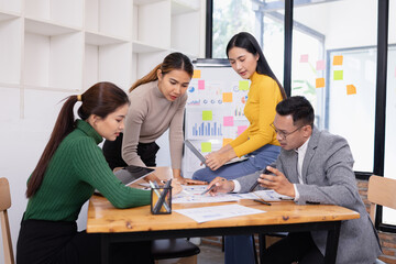 Group of business people working together with dashboard analysis and data management in conference room, Corporate business and dashboard to presentation concept.