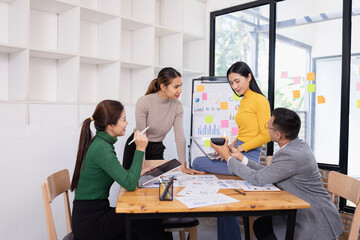 Group of business people working together with dashboard analysis and data management in conference room, Corporate business and dashboard to presentation concept.