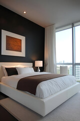 A modern bedroom with dark walls, sleek white furniture, and contemporary wall art