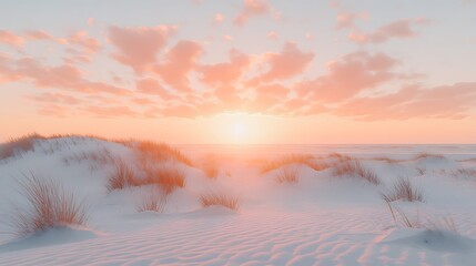 A beautiful sunrise over a sandy beach and some small dunes