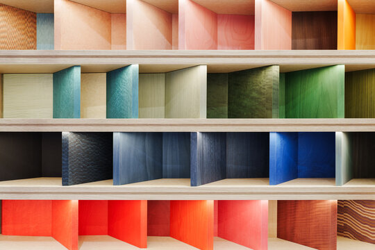 Colored wooden boards on the shelf