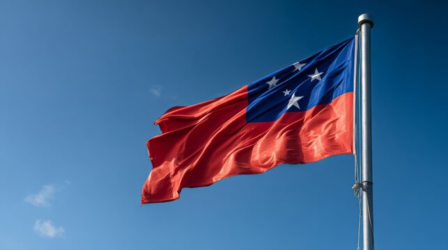 Flag of Samoa proudly displayed during Independence Day celebration under a clear blue sky