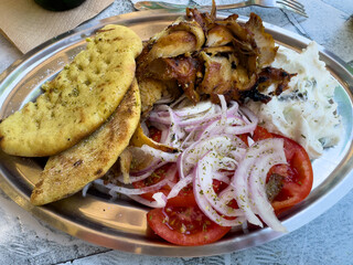 Greek gyros with tzatziki and freshly baked bread