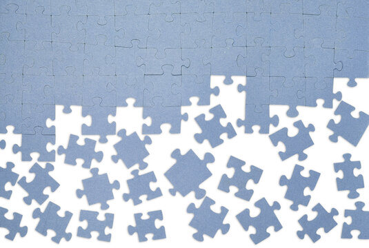 Blue jigsaw puzzle with missing pieces on a transparent background. Incomplete game, concept of problem solving, teamwork, or finding solutions. PNG.