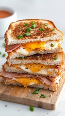 Overhead View of a Stack of Grilled Cheese Sandwiches with Ham