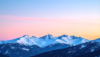Snow-capped peaks under a pastel sky fade from pink to gold above a dark mountain range