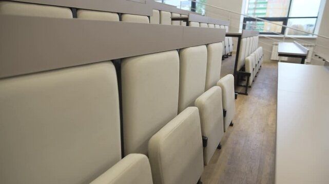 Detailed shot highlights ergonomic chairs along with tables. Practical layout and compact design ensures efficient space utilization