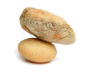 Pebbles with scratches and patterns are isolated on a white background. clipping path