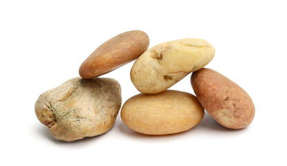 Pebbles with scratches and patterns are isolated on a white background. clipping path