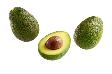Fresh ripe avocados with halved seed displayed on black background, cut out