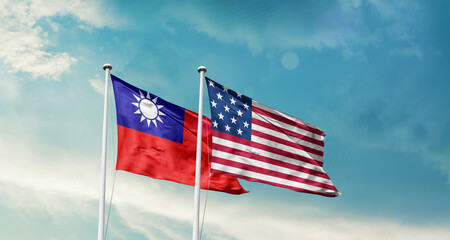 Taiwan and America friendship flags are waving in the sky.Two country flag for agreement or deal. Taiwan USA national flag for commitment.