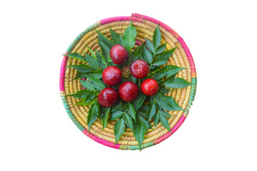 Isolated plums fruit. Top view fresh red plums fruit on white background. clipping path, Basket with fresh purple plums and a towel on a wooden table in the garden on a sunny day. Copyspace