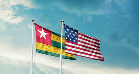 Togo and America friendship flags are waving in the sky.Two country flag for agreement or deal. Togo USA national flag for commitment.