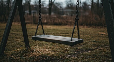 Empty Wooden Swing Set in a Quiet Meadow