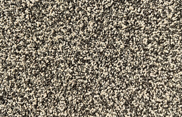 Soft beige and gray wall decor texture with fine granules. Elegant and minimal background ideal for interiors, packaging or architectural design.