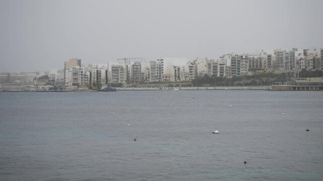Bugibba Seafront on Cloudy Day, Malta