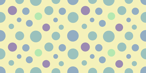 A pattern of varying-sized circles in soft shades of purple, blue, and green, set against a light yellow background.