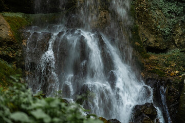 Fototapeta premium Waterfall Crashing on Rocks