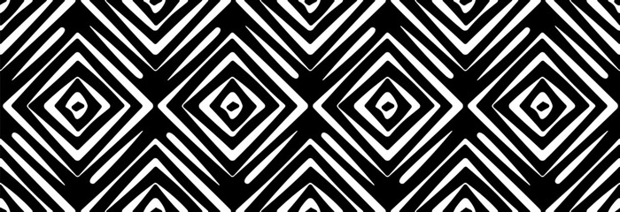 White geometric rhombuses on a black background. Seamless pattern