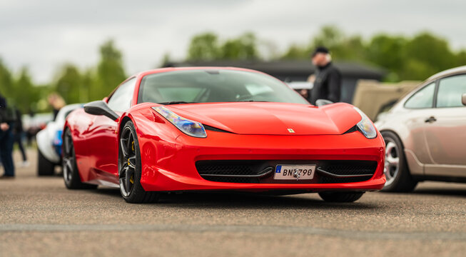 Gothenburg, Sweden - May 11 2025: Ferrari 458 Italia side angle showing sleek design.