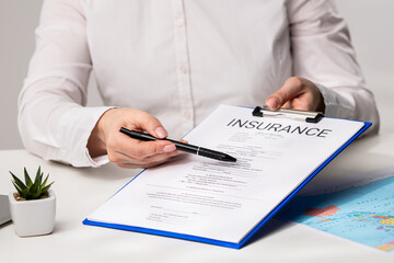 Professional Insurance Agent Discussing Policy Agreement Details