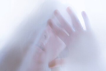 Art photo of model and airy fabric