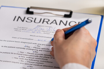 Filling Out Insurance Medical Examination Form for Coverage