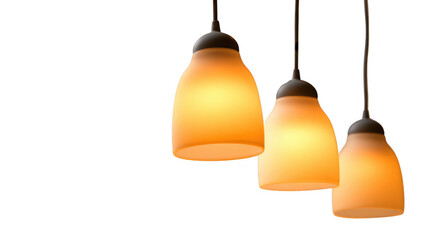 Obraz premium Three frosted glass pendant lights emit a warm, inviting glow, hanging against a transparent background, perfect for adding a touch of elegance to any design project